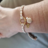 Bracelet réglable composé de breloques en tagua, acier inoxydable et nacre