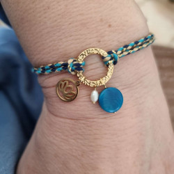 Bracelet réglable composé de breloques en tagua, acier inoxydable et nacre