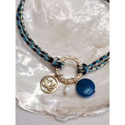 Bracelet réglable composé de breloques en tagua, acier inoxydable et nacre