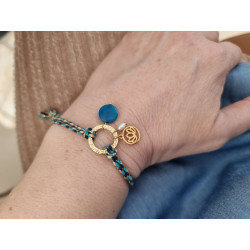 Bracelet réglable composé de breloques en tagua, acier inoxydable et nacre