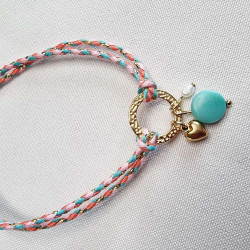 Bracelet réglable composé de breloques en tagua, couleur bleu lagon, et breloque au choix en acier inoxydable