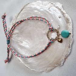 Bracelet réglable composé de breloques en tagua, couleur bleu lagon, et breloque au choix en acier inoxydable