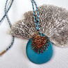 Collier avec son pendentif en tranche de graine de tagua, montée sur un cordon tressé en coton