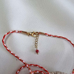 Collier avec son pendentif en tranche de graine de tagua, montée sur un cordon tressé en coton